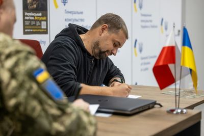 'I Had To Gather My Strength': Ukrainians Abroad Sign Up To Fight