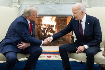 Democrats split after Biden shook hands with Trump — the man he spent years calling a threat to democracy