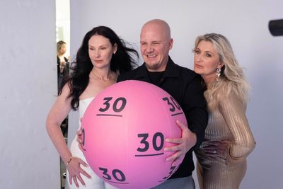 Lottery winners snapped by celebrity photographer for 30th anniversary