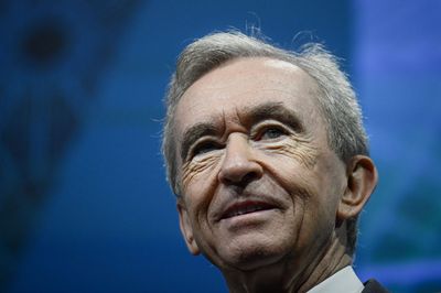 Former French security agency head is in court for allegedly spying for LVMH billionaire Bernard Arnault