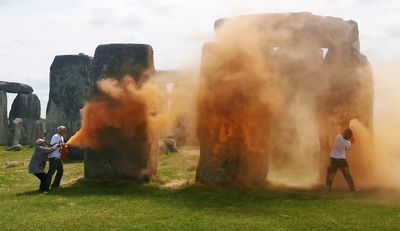 Two charged after orange paint powder thrown over Stonehenge in Just Stop Oil protest