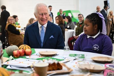 Charles makes birthday visit to surplus food project