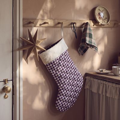 5 stylish and unique places to hang Christmas stockings around the home - that aren't a mantelpiece