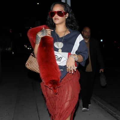 Rihanna Scores a Winter Color Trend Hat Trick in a Red Sheer Skirt, Sunglasses, and a Vintage Fox-Fur Stole