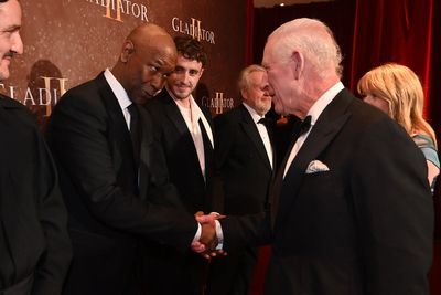 Denzel Washington admits he 'didn’t know' how to greet King Charles at Gladiator II premiere in London