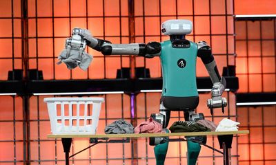 ‘A fork in the road’: laundry-sorting robot spurs AI hopes and fears at Europe’s biggest tech event