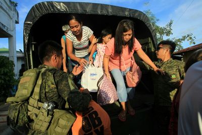 Tens Of Thousands Flee As Super Typhoon Man-yi Nears Philippines