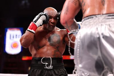 Why did Mike Tyson keep biting his gloves during the Jake Paul fight?