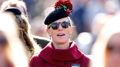 Zara Tindall's raspberry red coat and cherry knee-high boots made the chicest winter uniform