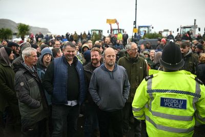 Sir Keir Starmer defends Budget as furious farmers protest outside Welsh Labour conference