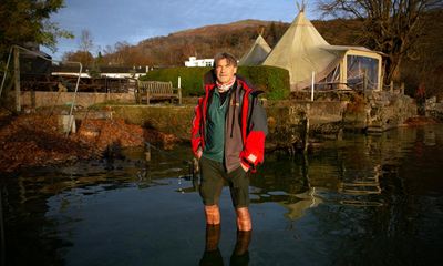 ‘It’s a national disgrace’: fury at sewage-filled Windermere over toxic algae and dead fish