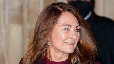 Carole Middleton's forest green jumper and checked trousers prove comfort and festive elegance go hand-in-hand