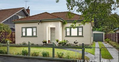 Melbourne 1930s weatherboard soars $412,000 over reserve in first sale in 35 years - while Sydney sellers struggle