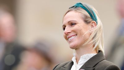 Zara Tindall enjoys day at the races in the most stunning military green coat and caramel-brown knee high boots