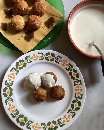 Rachel Roddy’s recipe for cauliflower polpette with cheese sauce