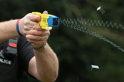 Met officer charged with GBH after tasered suspect fell from building