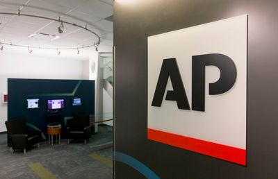 The Associated Press says buyouts and some layoffs are ahead as it seeks to cut its workforce by 8%