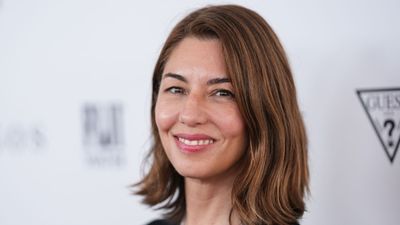 Sofia Coppola decorates her stairs with garlands, poinsettias, and bows for a Christmas aesthetic that will look just as good in 100 years – it's replicable from $8