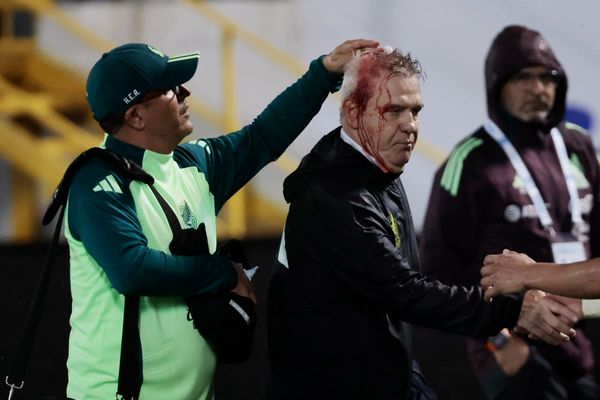 Honduras handed punishment after Mexico coach hit with beer can thrown from stands