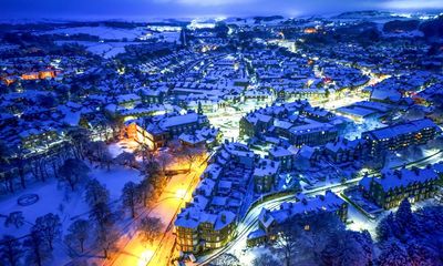 ‘First taste of winter’ snow in UK brings school closures and travel disruptions