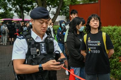 Despondency And Defiance As 45 Hong Kong Campaigners Jailed