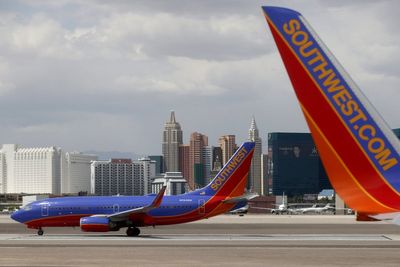 Southwest flight drama as phone battery sets fire to plane seat causing evacuation