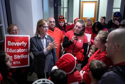 Striking Massachusetts teachers appeal to governor on Statehouse steps