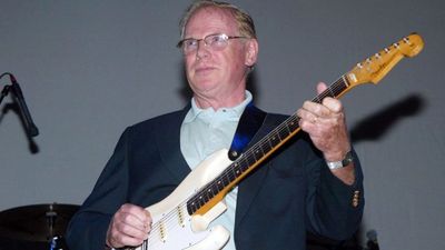 “I put a crushed cigarette packet underneath it to get it nearer the strings... It helped give the guitar a mysterious sound”: Vic Flick, the guitarist who played the iconic James Bond riff, dies aged 87