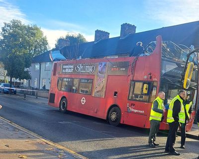 Dagenham bus crash: Two taken to hospital after roof ripped off double-decker