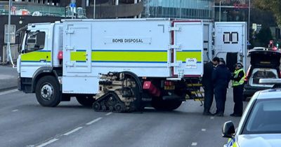 Specialist cops and bomb disposal robot at bus station amid 'suspicious package'