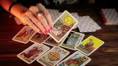 Psychic Accused of Scamming Customers Has Tarot Cards and Crystal Balls Seized by Police