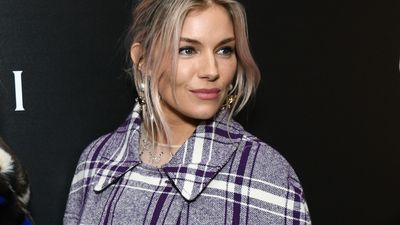 Honestly, Sienna Miller's plum-toned tartan cape and lacy tights made a chic winter warmer you won't regret taking inspiration from