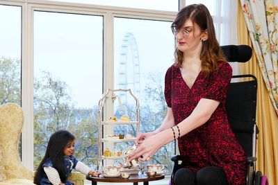 World’s tallest and shortest women meet for afternoon tea in London