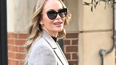 Amanda Holden's mini skirt with black knee high boots and matching blazer made monochrome look insanely chic