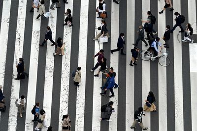 Japan passes $250B economic package meant to lift wages and spur growth