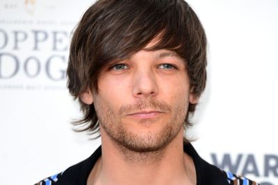 Louis Tomlinson donates cherished football shirt to Grenfell tribute project