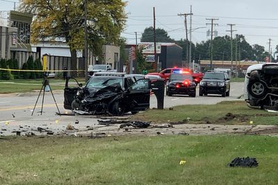 Detroit-area police officer charged with manslaughter in crash that killed 2 men