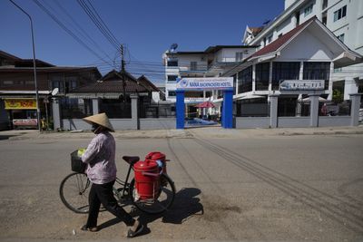 Laos pledges justice after suspected tainted alcohol kills tourists