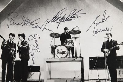 Signed Beatles photo and Sex Pistols lyrics sell for more than £130,000