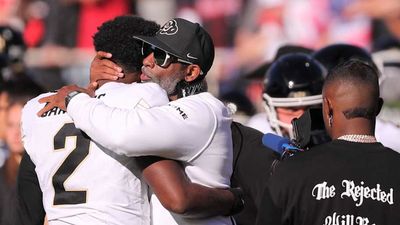 Officials Pick Up Flag After Low Hit by Kansas DE on Colorado QB Shedeur Sanders