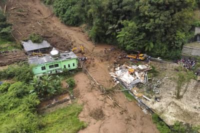 Rescuers Recover Bodies After Flash Floods Hit Sumatra Villages