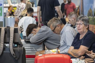 Holiday travel headaches could loom as FAA warns it might need to slow down air traffic