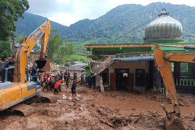 Rescuers recover 20 bodies from flash floods and landslides on Indonesia's Sumatra island