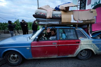 Middle East latest: Displaced people return to south Lebanon as ceasefire appears to hold