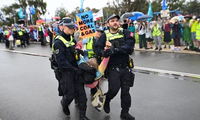 Rising Tide protesters arrested in Canberra for blocking road to Parliament House