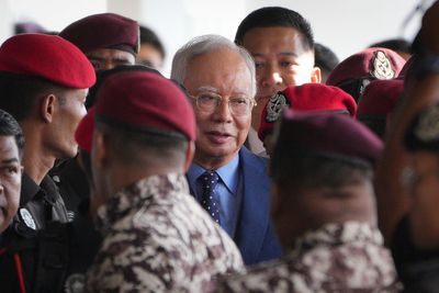 Malaysian court drops one of the graft cases against jailed former premier Najib Razak