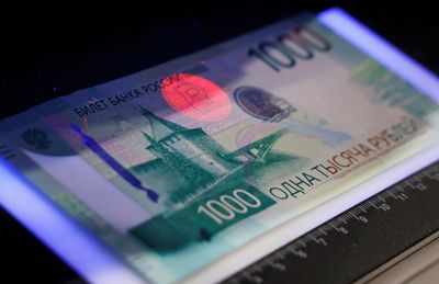 Russian rouble drops to lowest level against the dollar in 32 months