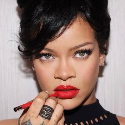 Rihanna Reveals Her Go-To Red Lipstick Combo With a Retro Beehive Updo