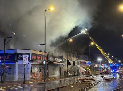 Holloway fire: Five rushed to hospital as 100 firefighters battle huge blaze at takeaway in north London