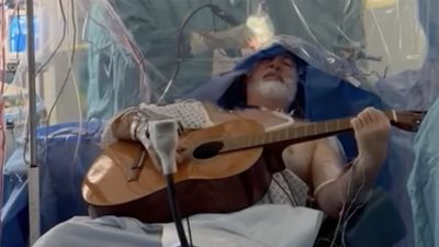 “I couldn’t process playing any familiar songs but strummed chords. The whole experience was fascinating”: Guitarist undergoes eight-hour brain surgery – and plays his acoustic during the operation